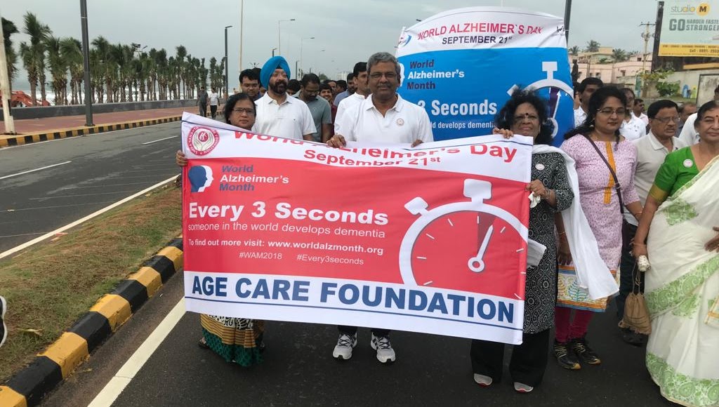 A caregiver providing gentle support to a senior patient.