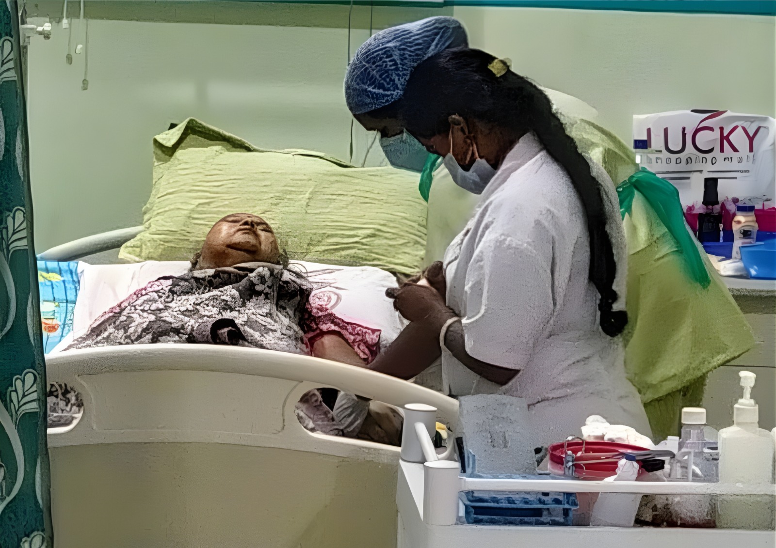 A nurse providing comfort to a patient in a calm environment.